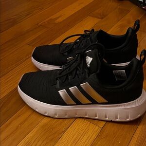 Adidas Black Sneakers with Silver Stripes